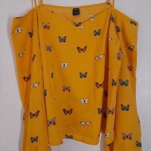 yellow blouse with butterflies